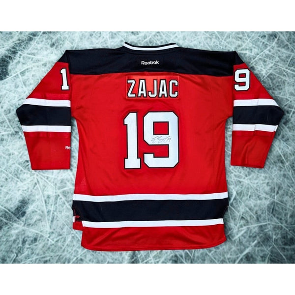 Travis Zajac Signed New Jersey Devils Alt Captain Reebok Jersey Youth L/XL Auto
