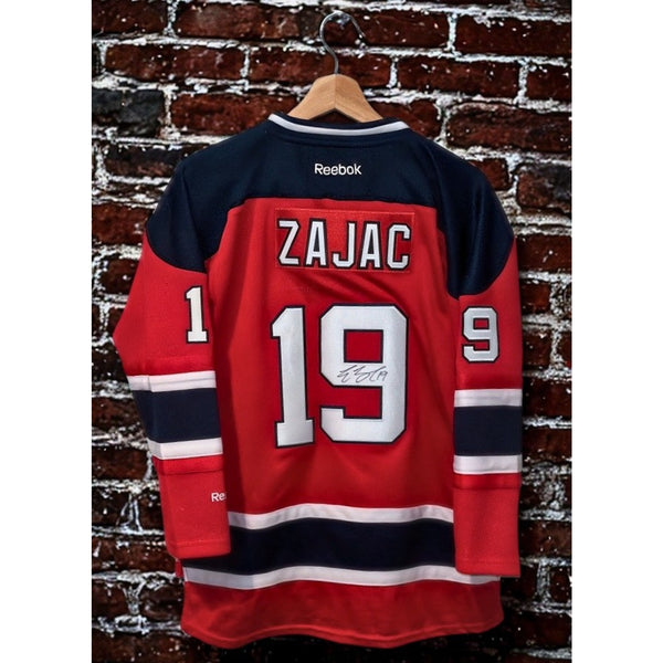 Travis Zajac Signed New Jersey Devils Alt Captain Reebok Jersey Youth L/XL Auto